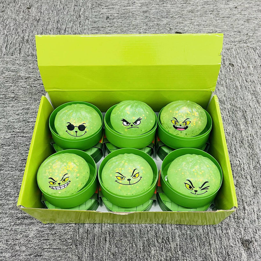 Glow-in-the-Dark Green Holiday Grinch Dumpling Squishy Toy