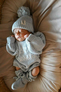Newborn knit pom beanie in sky blue from KH Baby in Port Neches, Texas